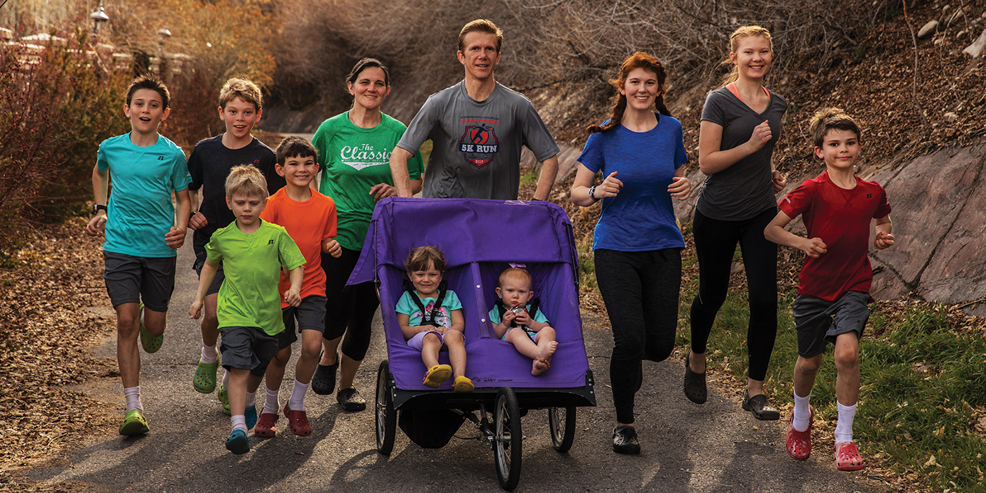 The large Pachev family out on a run, all wearing Croc shoes.