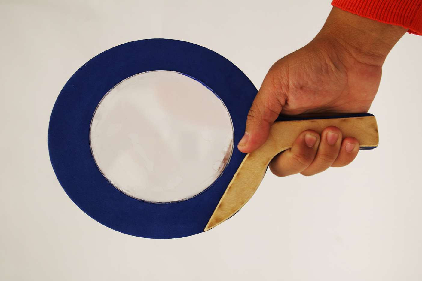 Photo of a paddle with a transparent center.