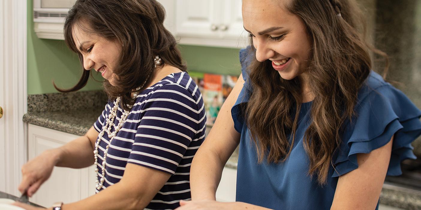 A photo of Susana Griffin working in the kitchen.