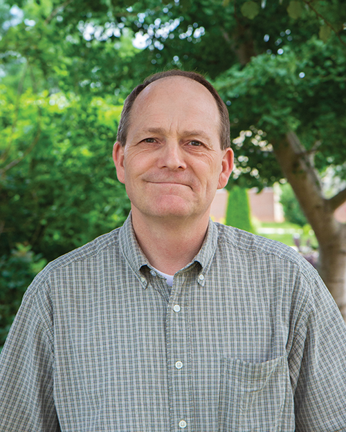 Portrait of author Darin Cozzens