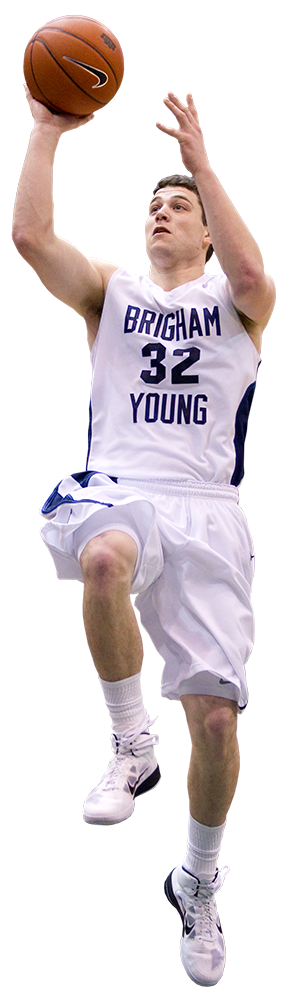 Jimmer Fredette makes a shot mid-jump during a BYU game.