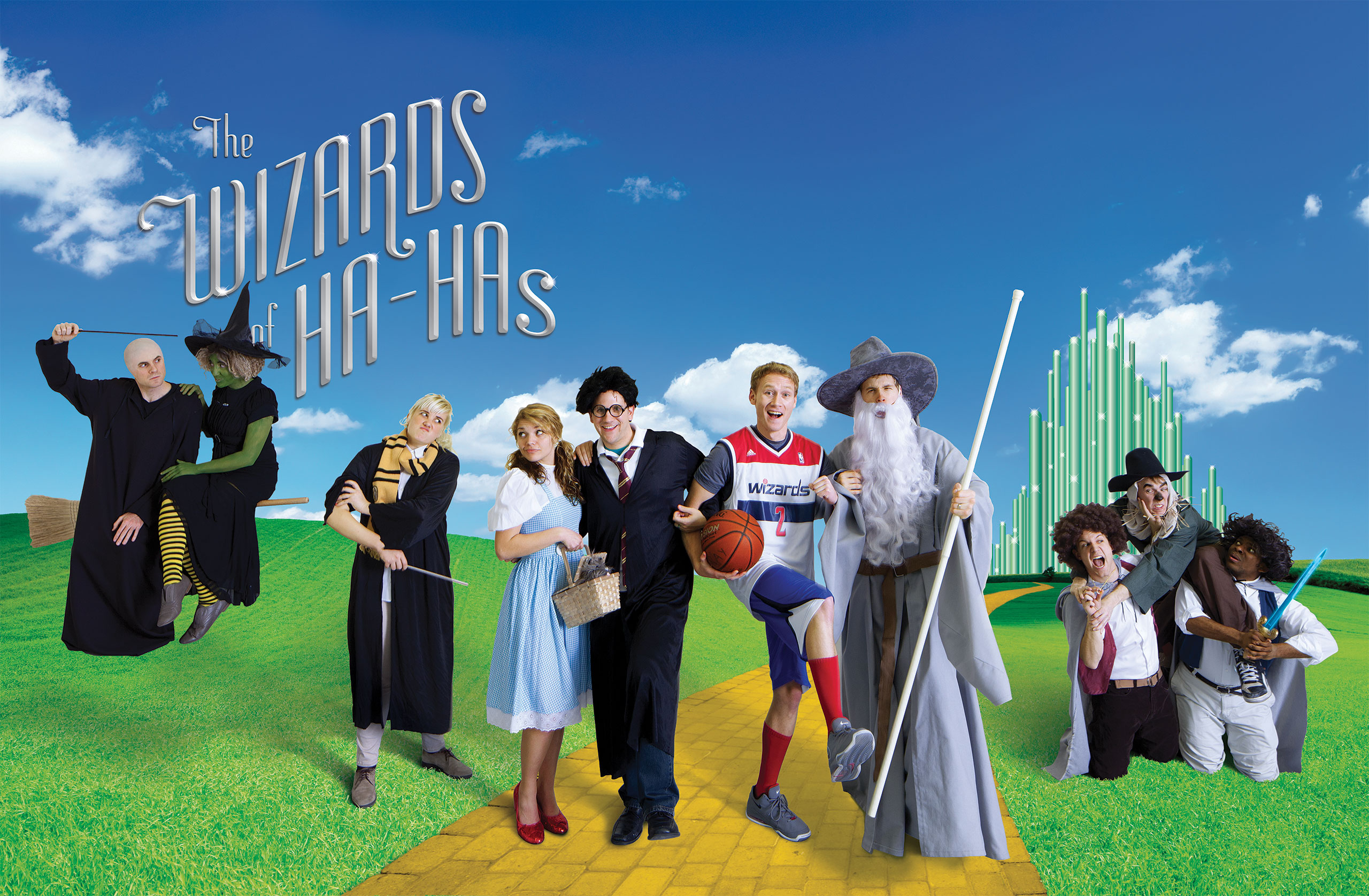 The stars of Divine Comedy appear in a fanciful landscape that nods to The Wizard of Oz or Harry Potter, complete with Voldemort, an Emerald City, brooms, and yellow brick road.