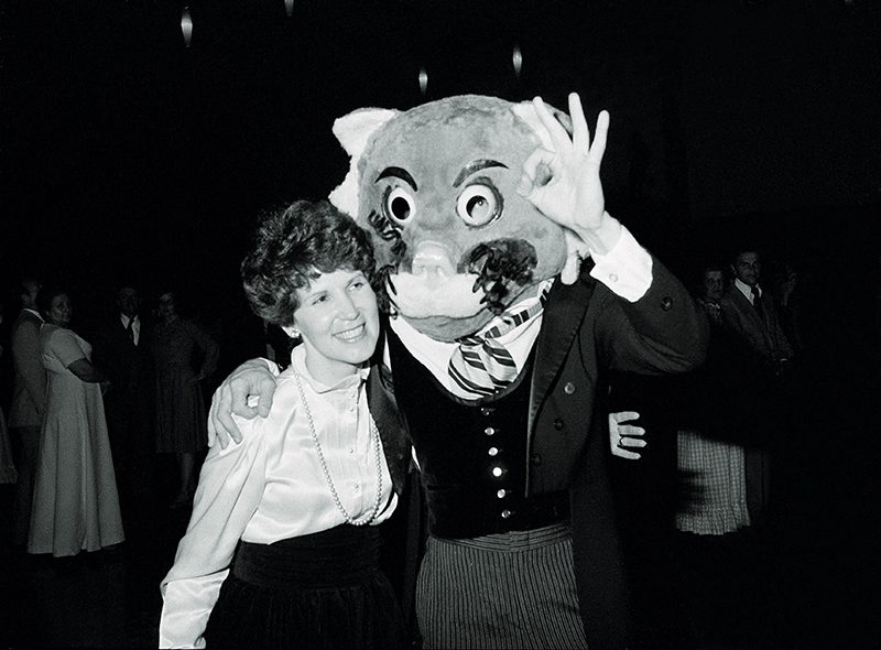 Cosmo poses with Patricia T. Holland.