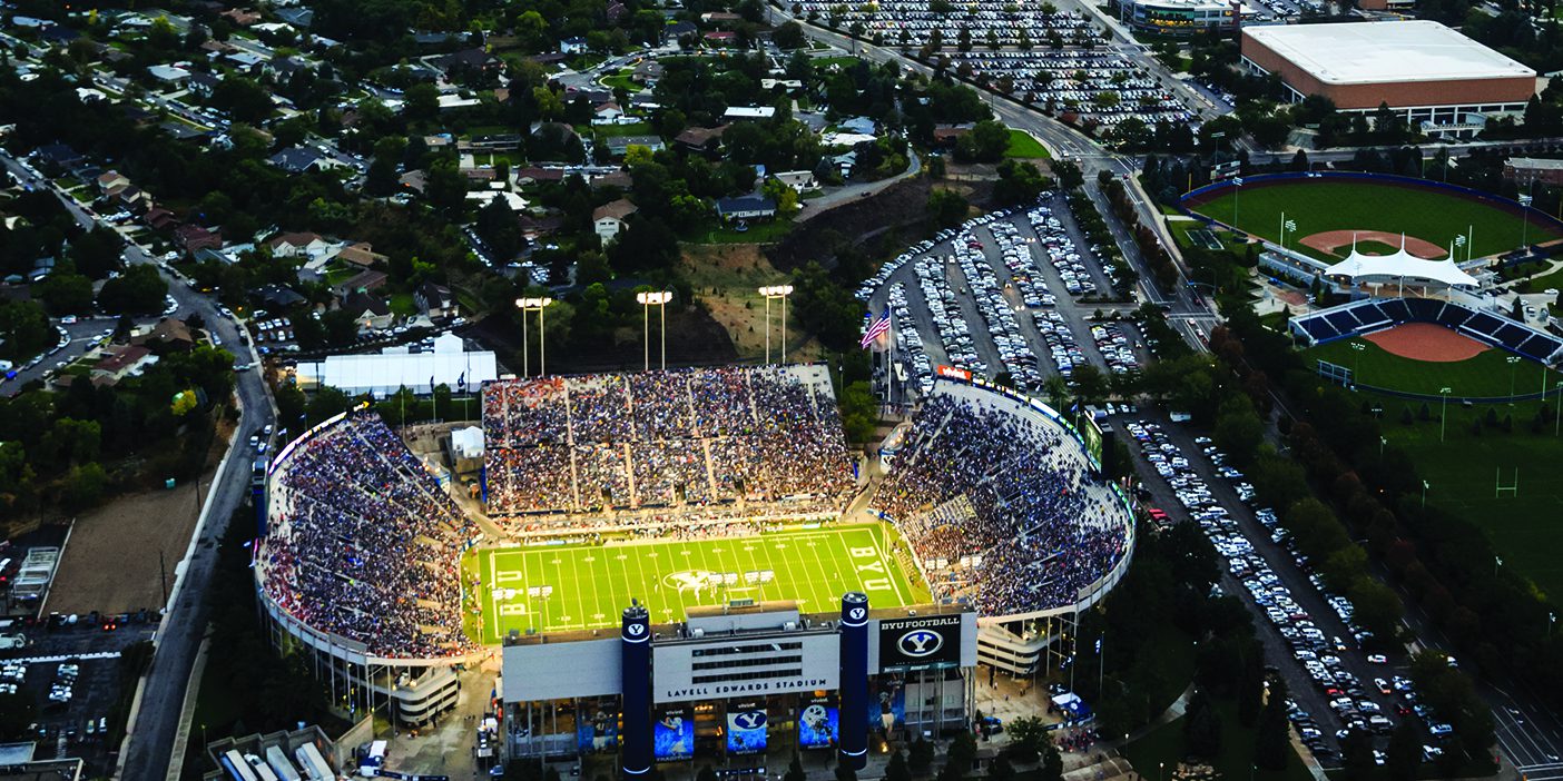 An aerial shot of LaVell Edwards Stadium with Y Mountain in the background.