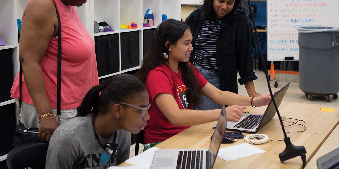 Young people work at computers at Baltimore's Digital Harbor Foundation.