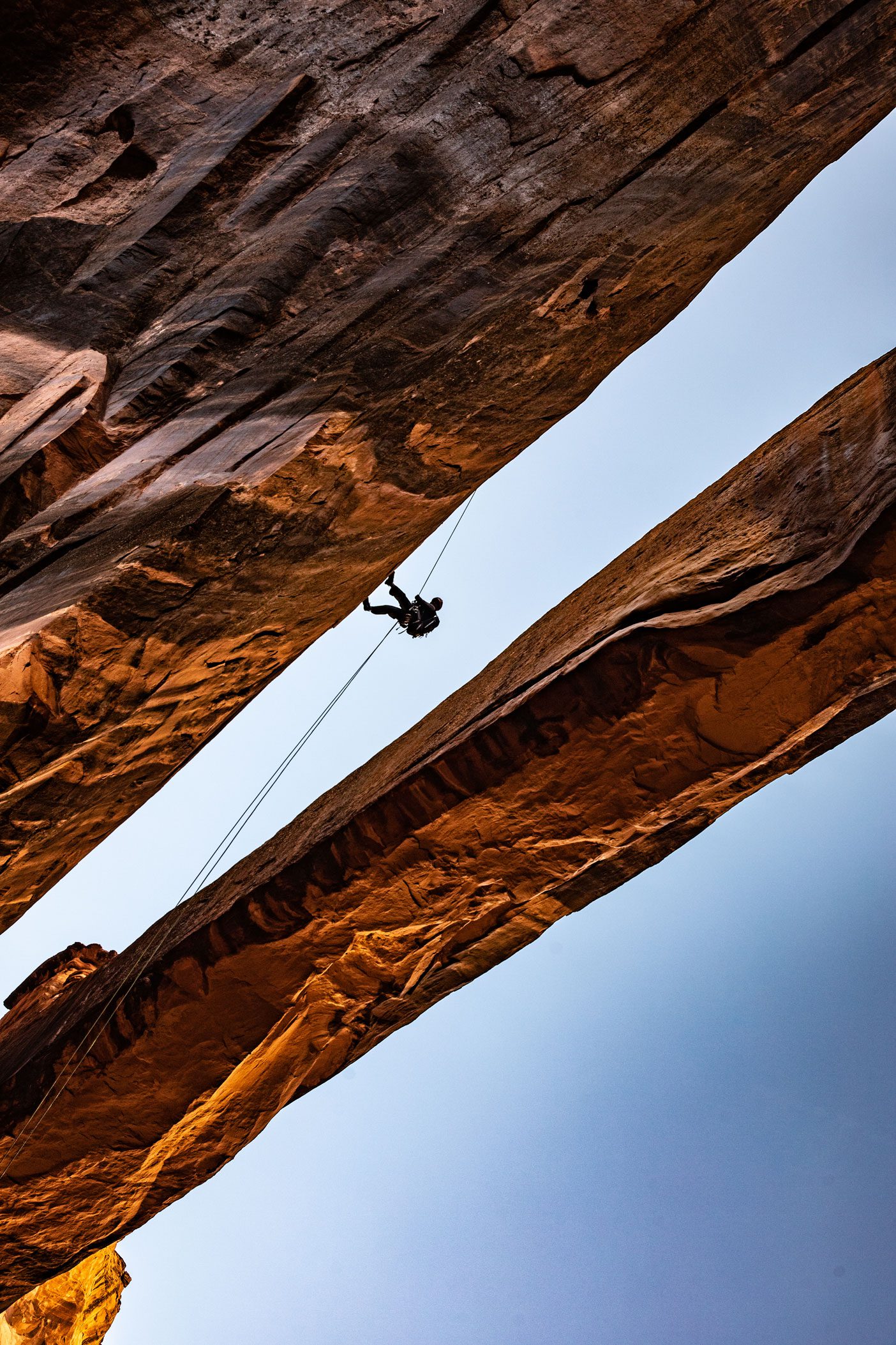 Stacy Taniguchi is pictured rappelling from Morning Glory Arch