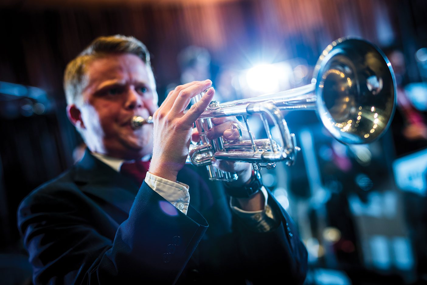 A close-up of a jazz trumpet player