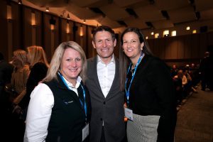 Steve Young stands in between Amy Wilson and Liz Darger at a BYU-hosted NCAA Common Ground event.