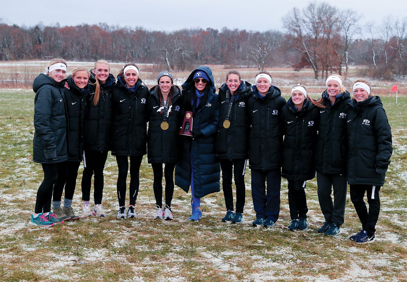 The BYU women's cross country celebrates their national race.