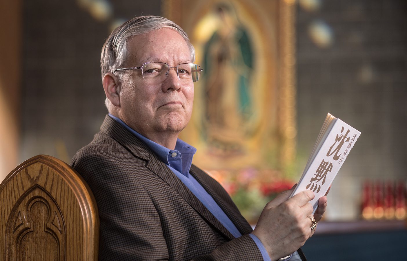 Professor Van Gessel reading a Japanese book.