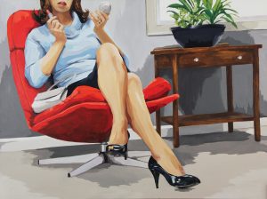 A woman in high heels and a skirt, whose eyes are out of the photo frame, reclines in a red chair and puts on lipstick with one hand. She is looking into a small cosmetic mirror in her other hand.