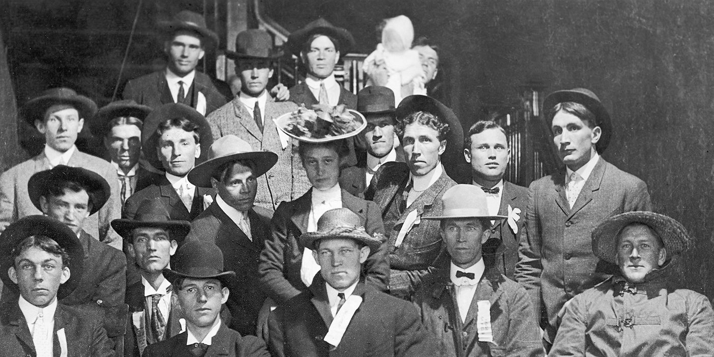 BYU track athletes from 1908 wearing ribbons