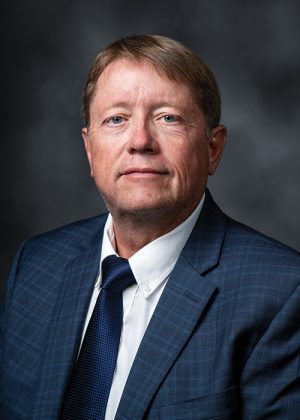 Headshot of Charles M. Anderson.