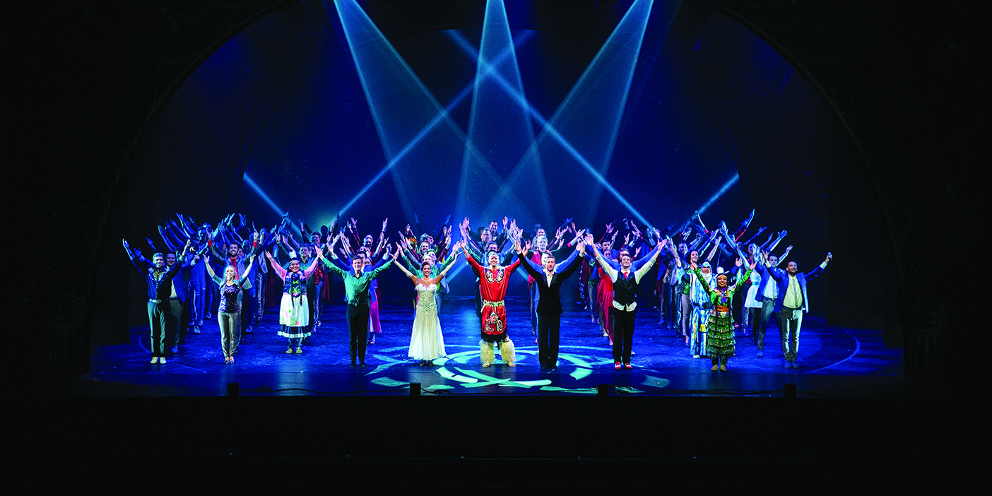 The BYU performers from the 2019 tour to China take a bow onstage.