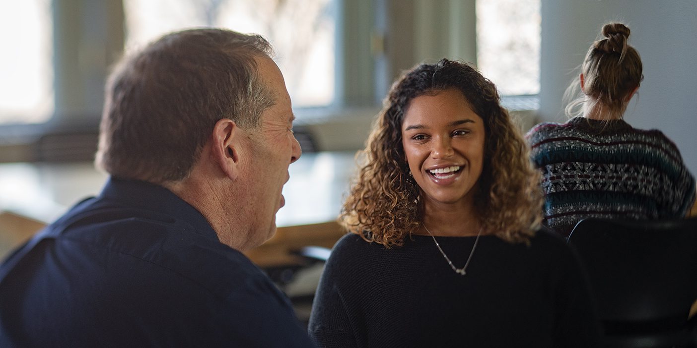 BYU student Kylee Shepherd meets with her freshman mentor, Ed Adams.