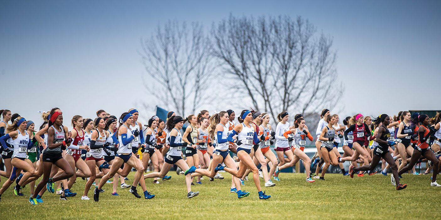 A pack of runners start the women's 2019 cross country national championship race.