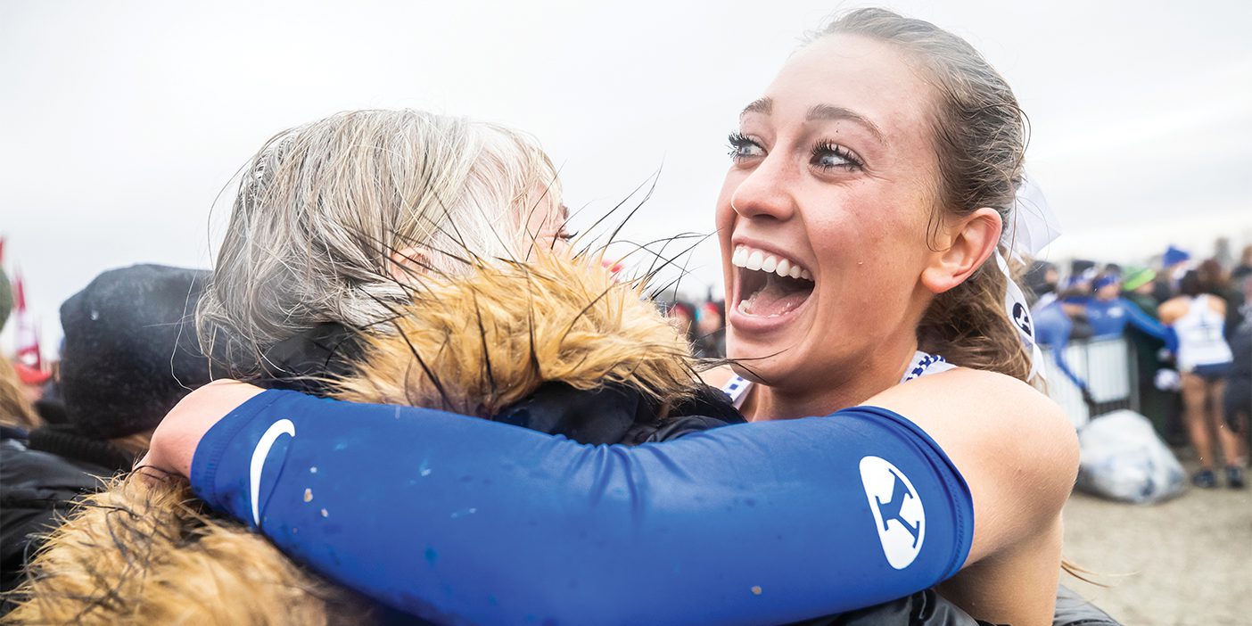 Courtney Wayment Smith celebrates her fifth-place finish at the 2019 cross country national championships.