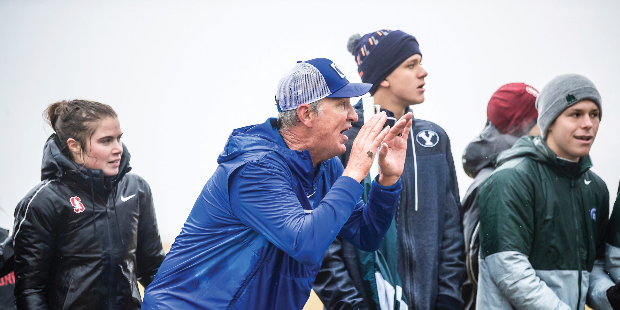 BYU men's cross country coach Ed Eyestone yells encouragement and advice to his runners at the 2019 cross country national championships.