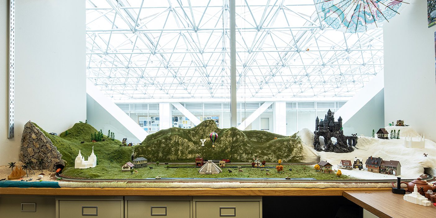 A diorama in James Gaskin's office featuring Y Mountain, Hogwarts, a hot air balloon, and a train.