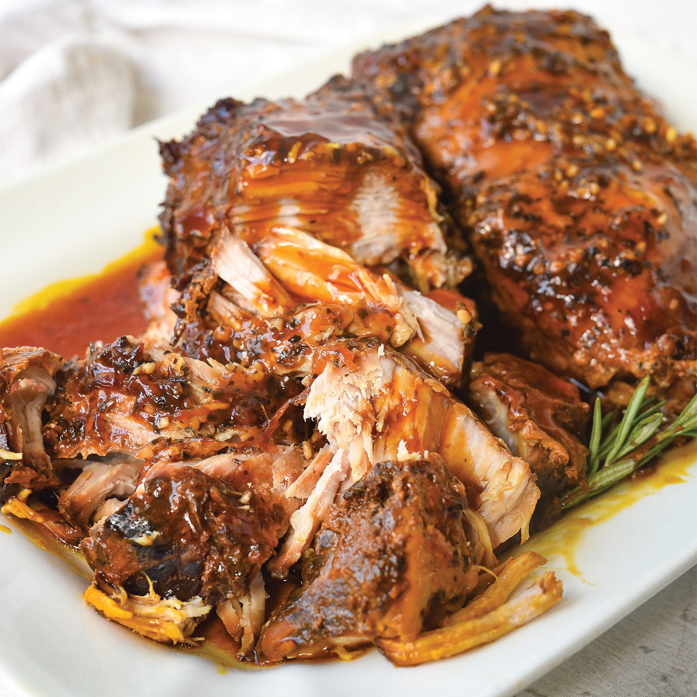 https://magazine.byu.edu/wp-content/uploads/2021/01/Crock-Pot-Parmesan-HOney-Pork-Roast-1-of-3.jpg