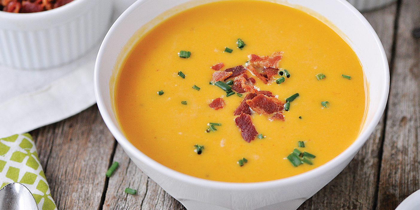 Chipotle butternut squash soup in a bowl.