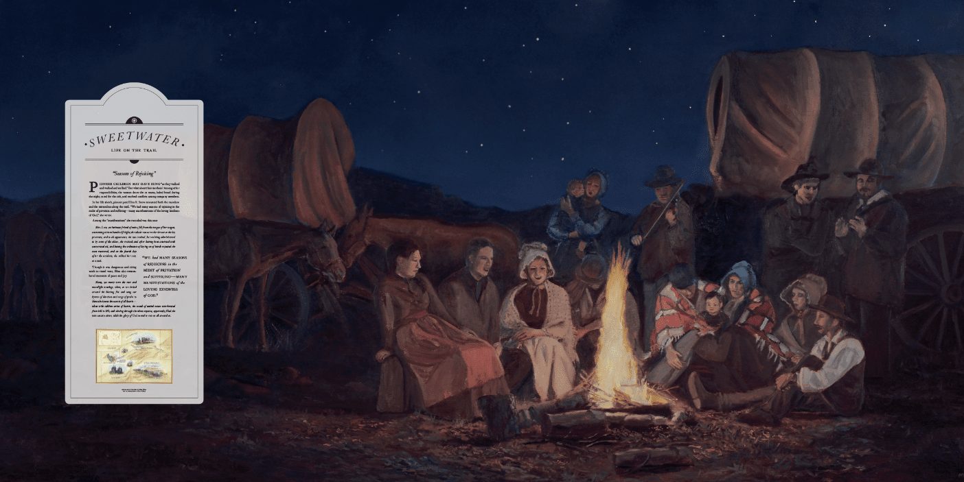 An illustration of a group of pioneers sitting around a fire at night.