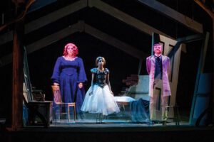 Ghostly projections of three BYU actors appear on stage during BYU's Illusionary Tales.