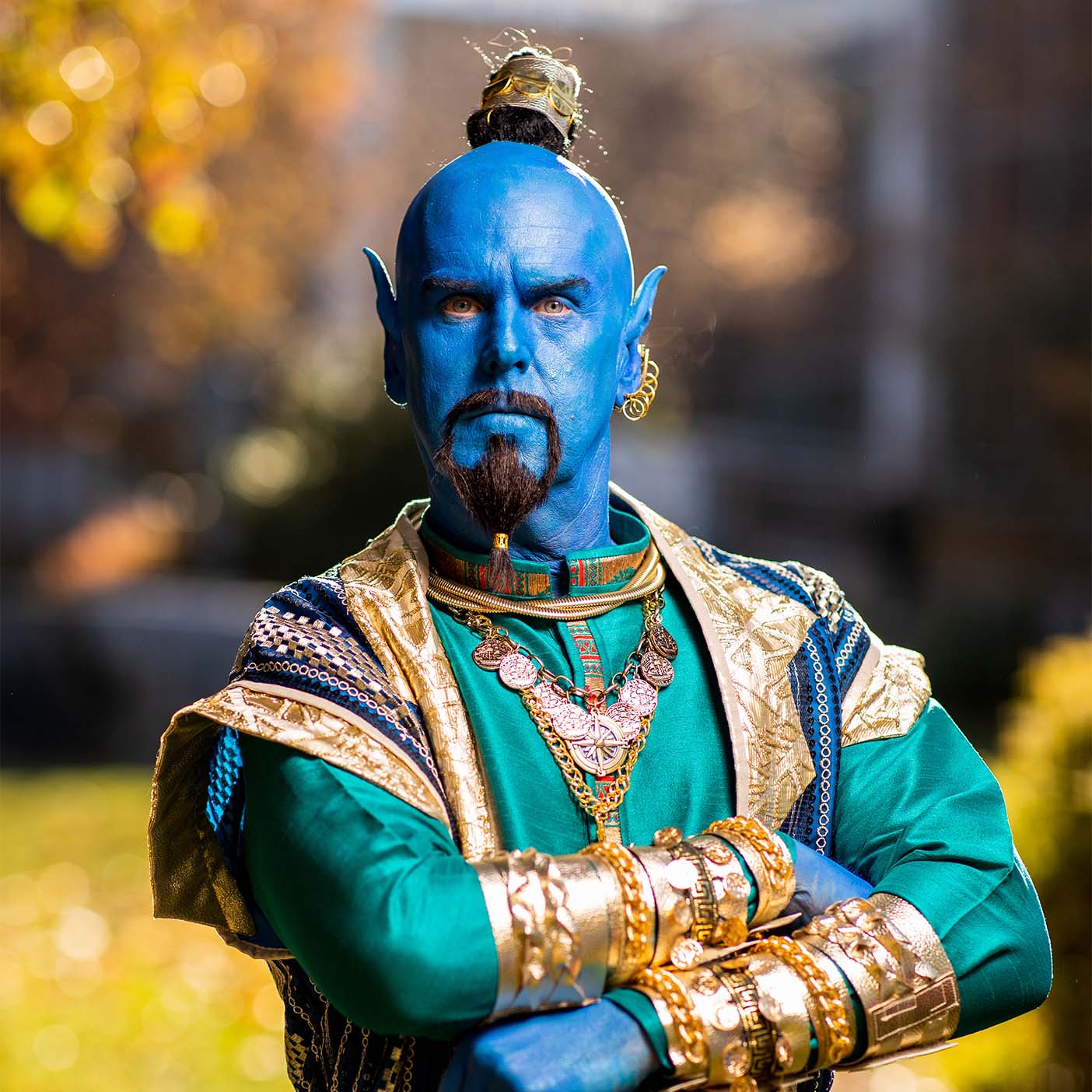 Tom Holmoe dressed up as the Aladdin's blue Genie for Halloween.