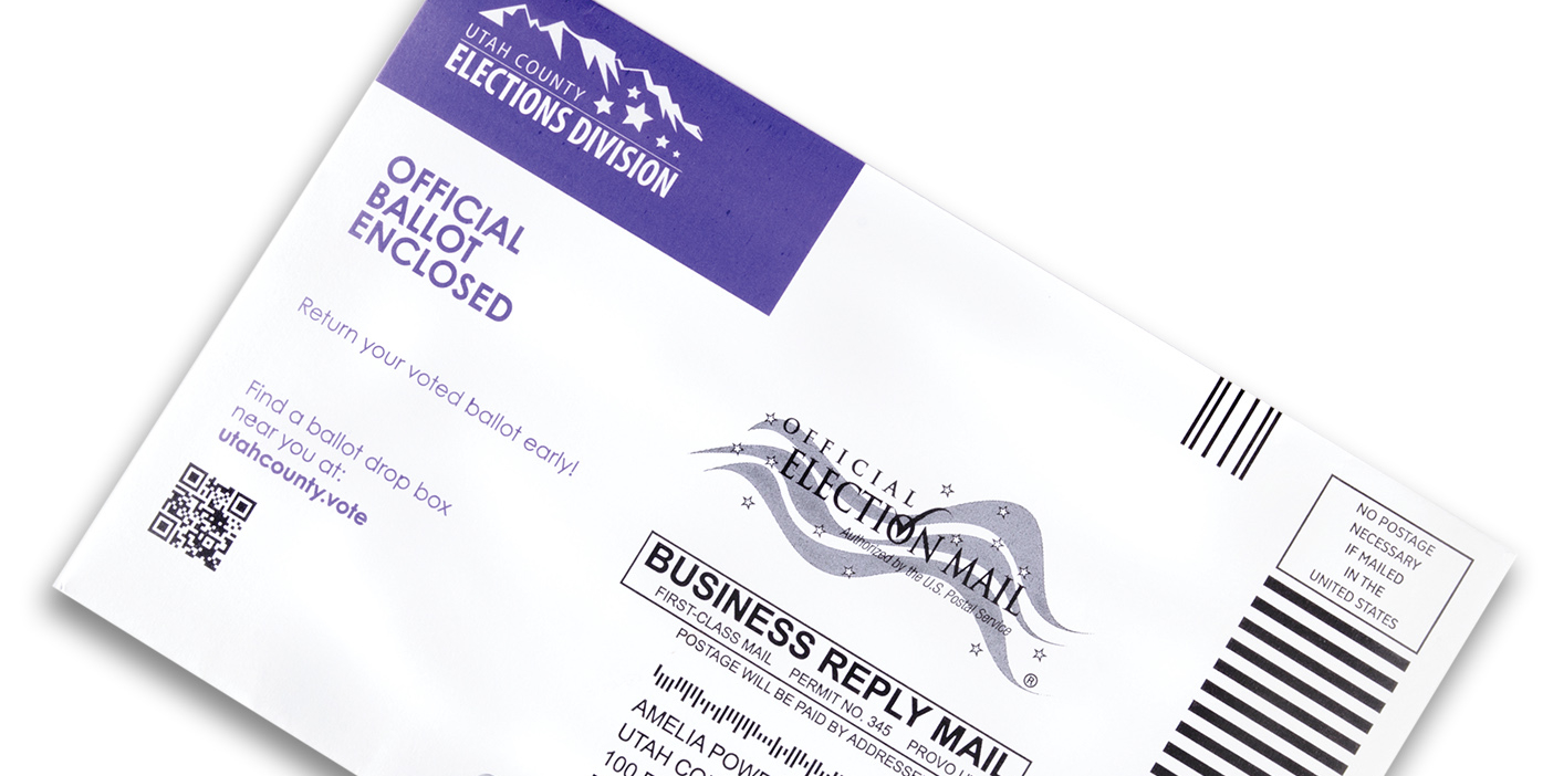 an official voting ballot envelope addressed to the Utah County Clerk/Auditor