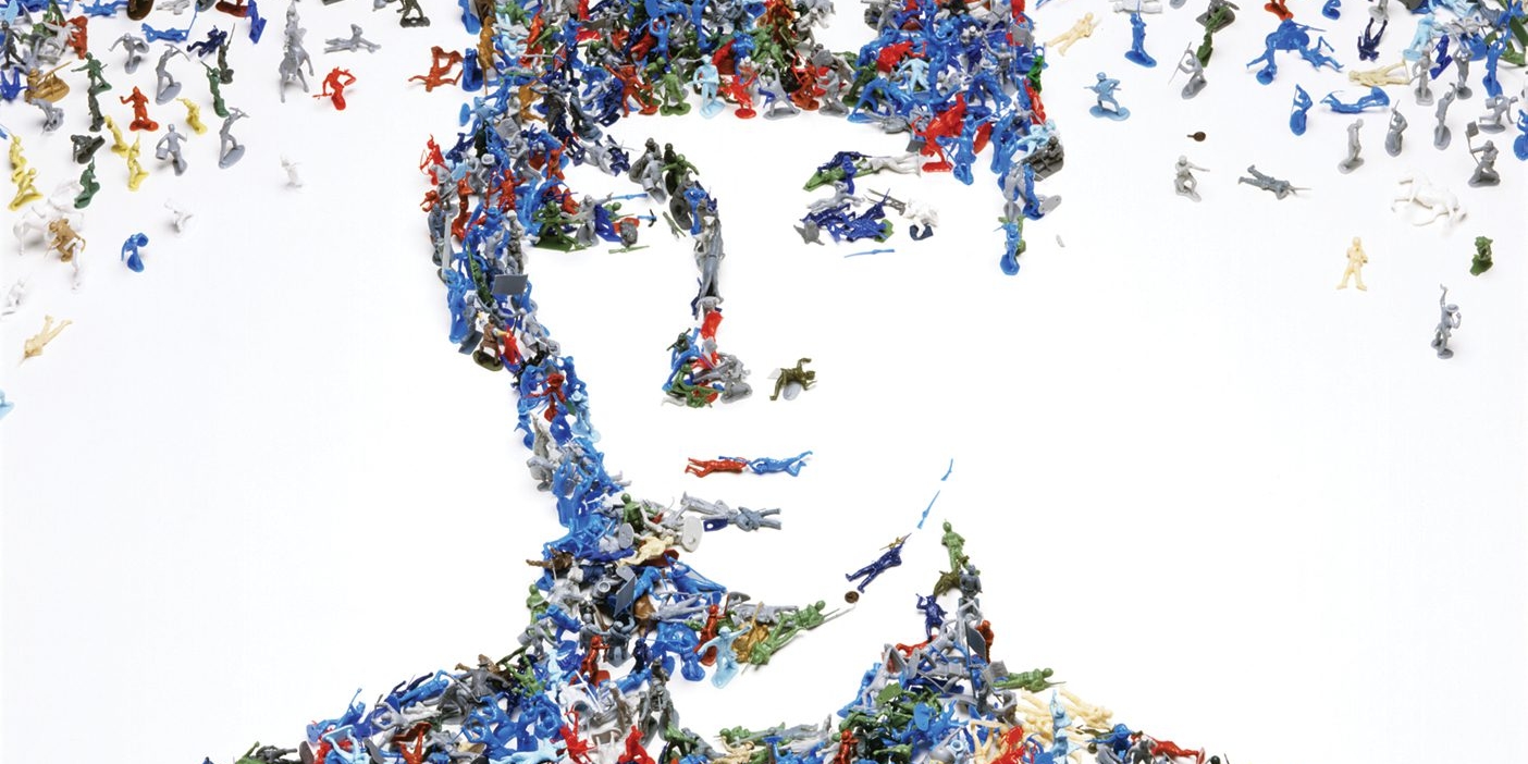 An art piece that shows a portrait of a soldier made out of toy soldiers
