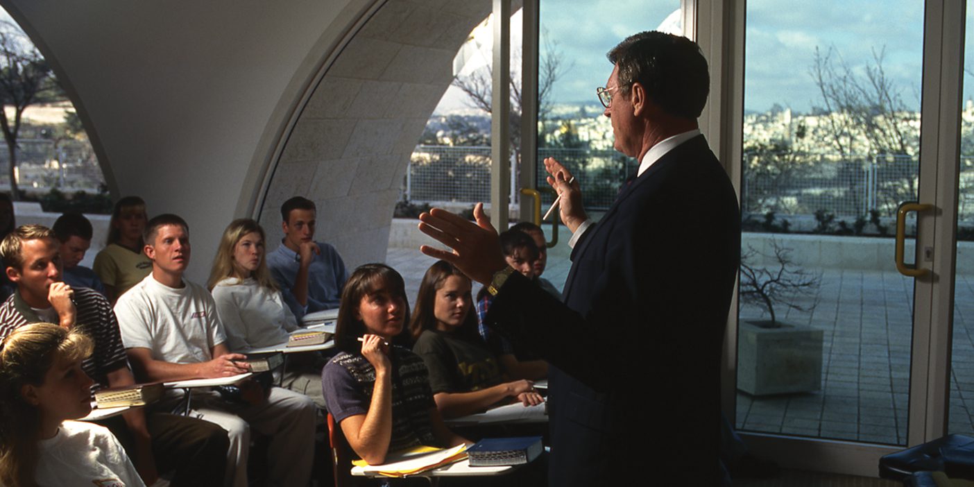 A professor teaches students inside the BYU Jerusalem Center.