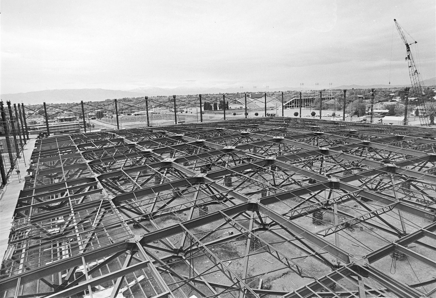 A black and white photo of scaffolding.