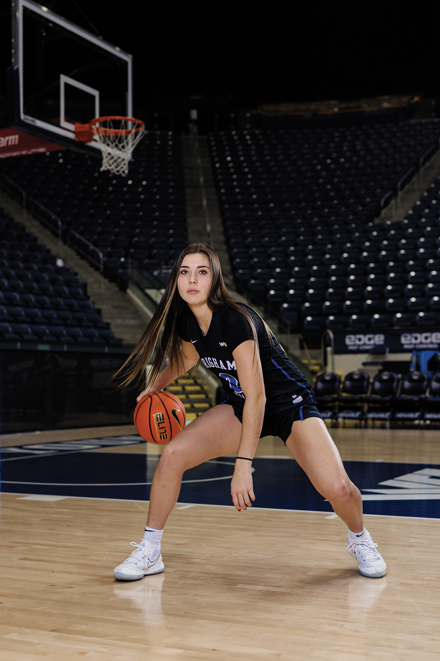 Shaylee Gonzalez dribbles a basketball