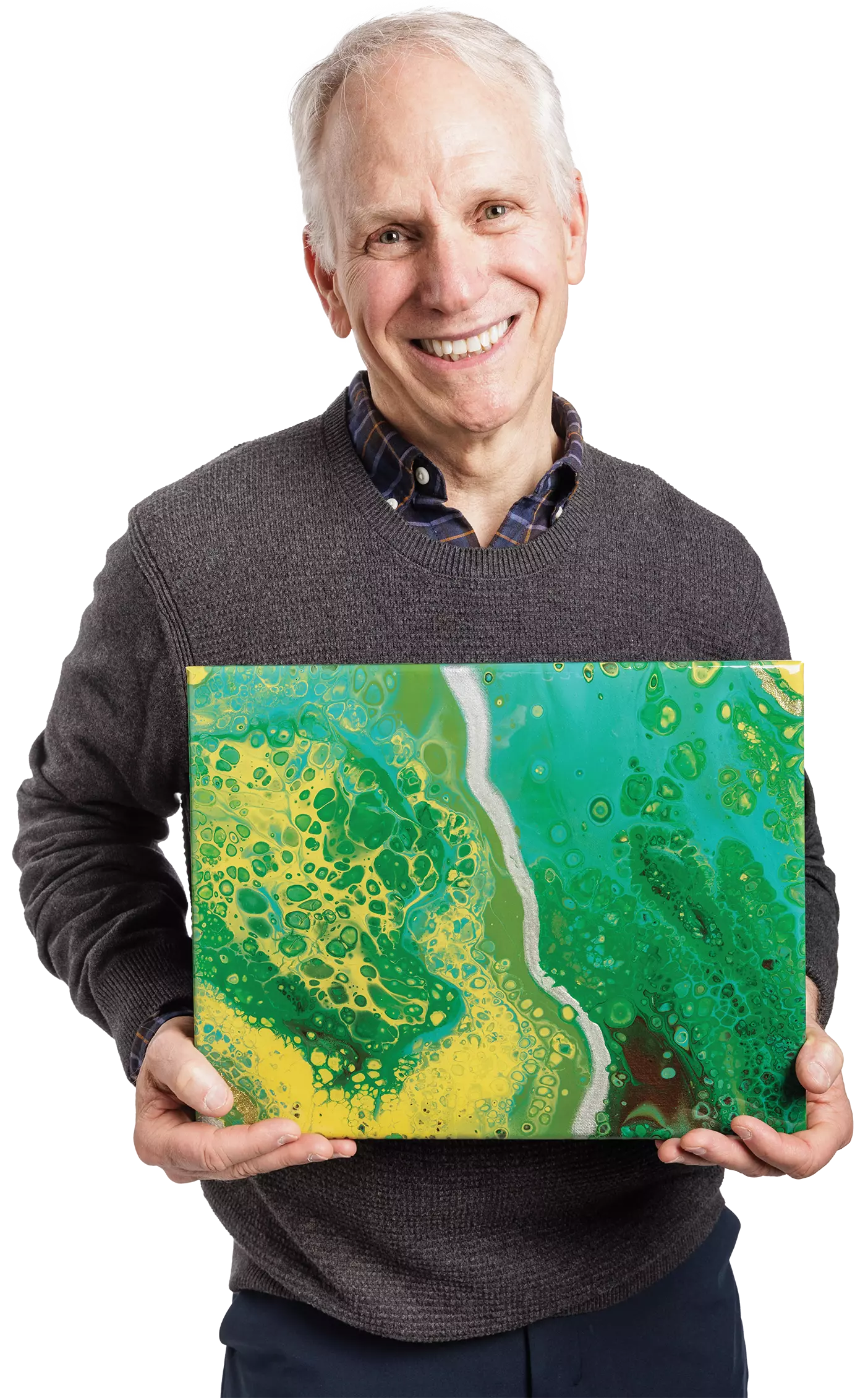 A man in a sweater holding a painting of green and yellow paint ripples and a silver streak running through the middle.