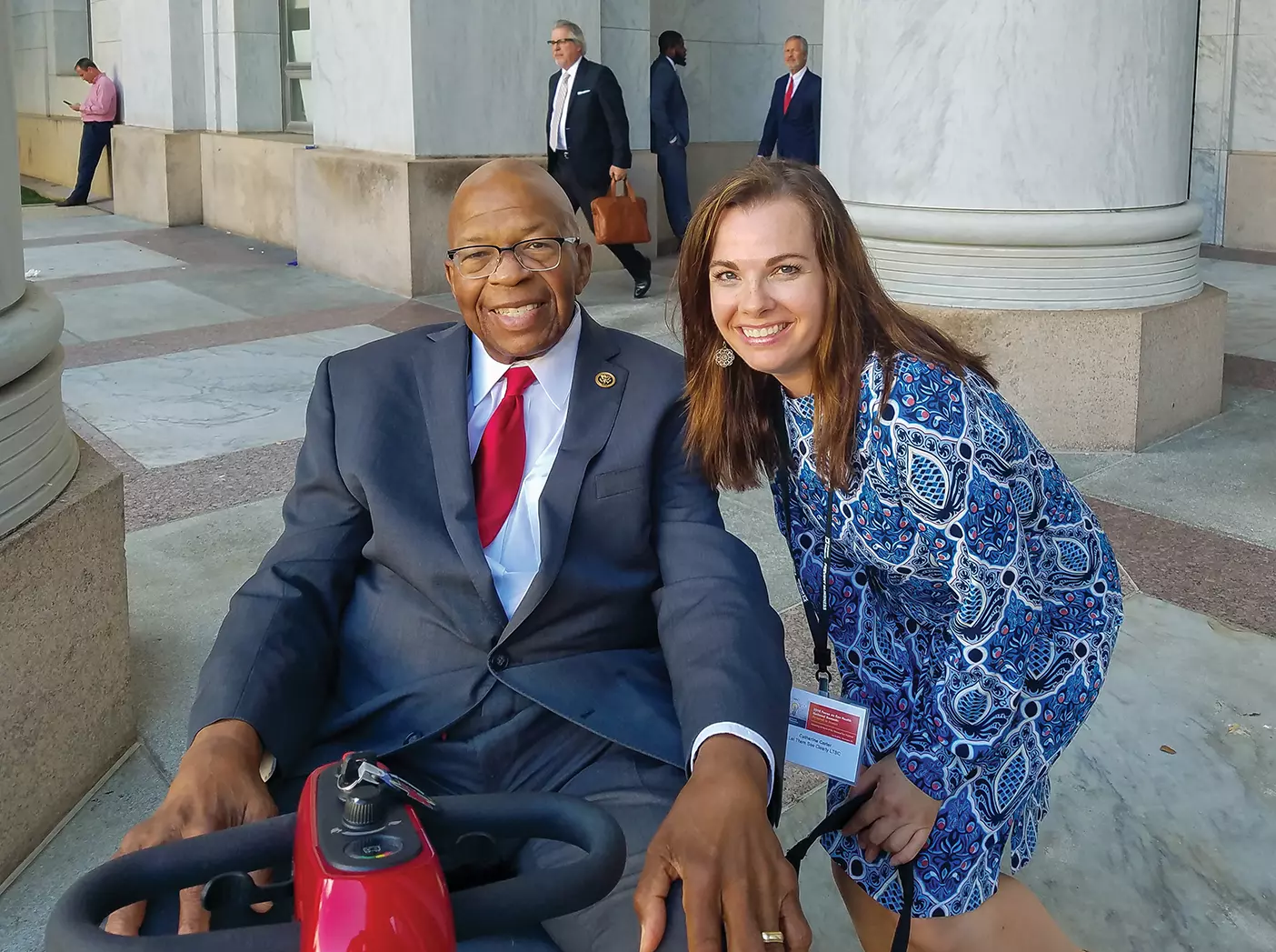 Photo of BYU alumna Catherine Carter meeting with Maryland Congressman Elijah Cummings in Washington, DC.