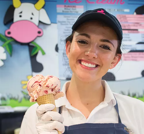 An employee at the BYU creamery.