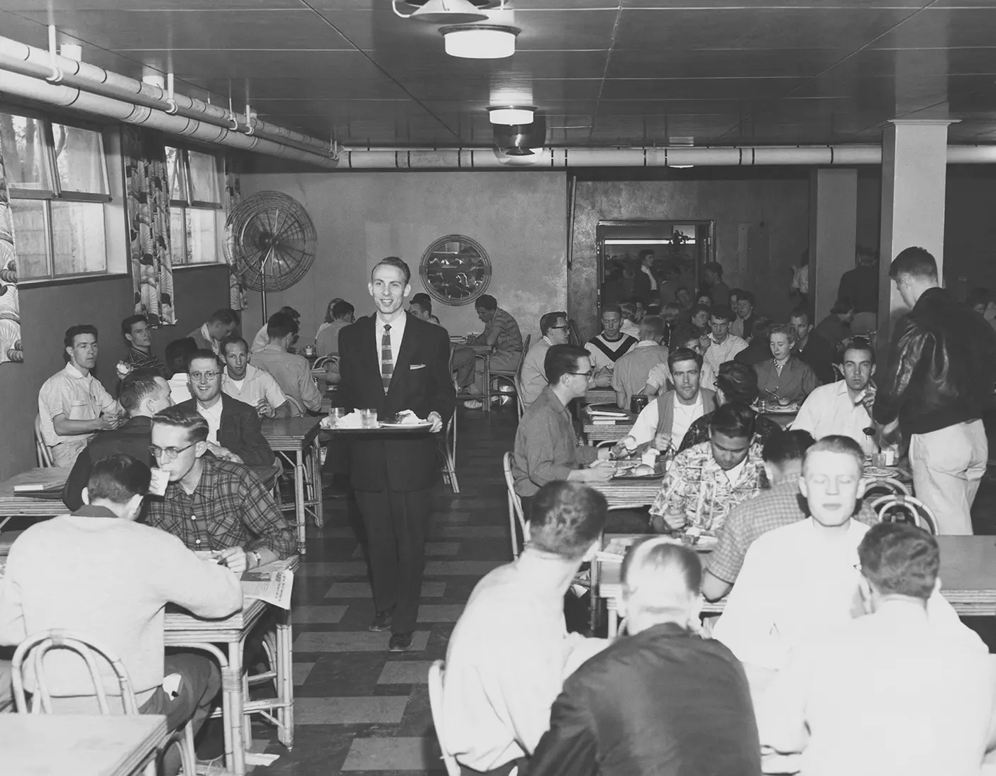 1950s students eat at the cafeteria in the old Joseph Smith Building on BYU campus.