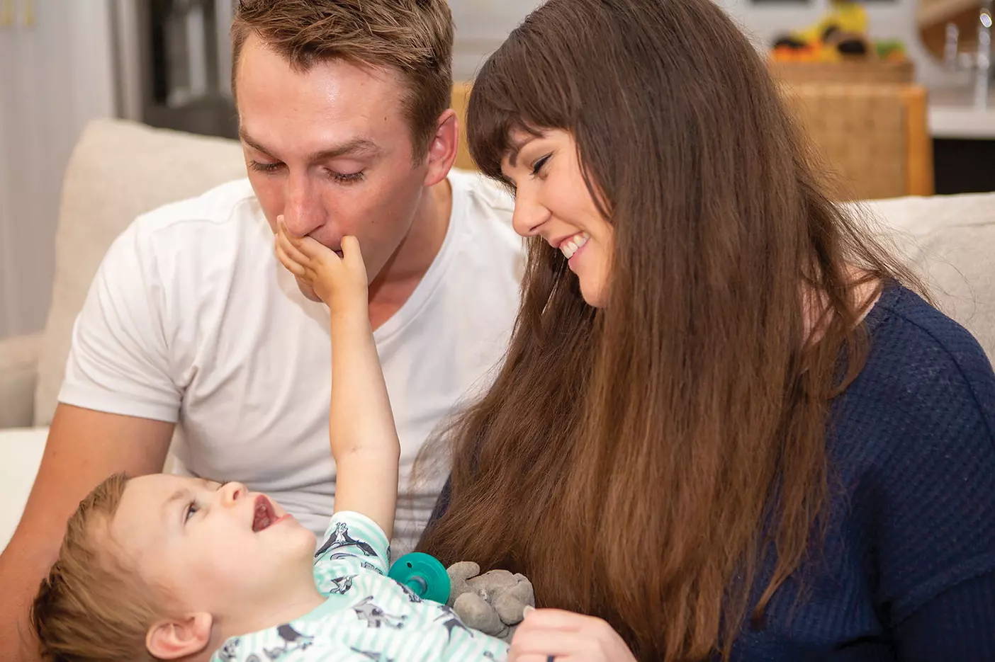 The Markham family: Brock, Brittany, and baby Damian