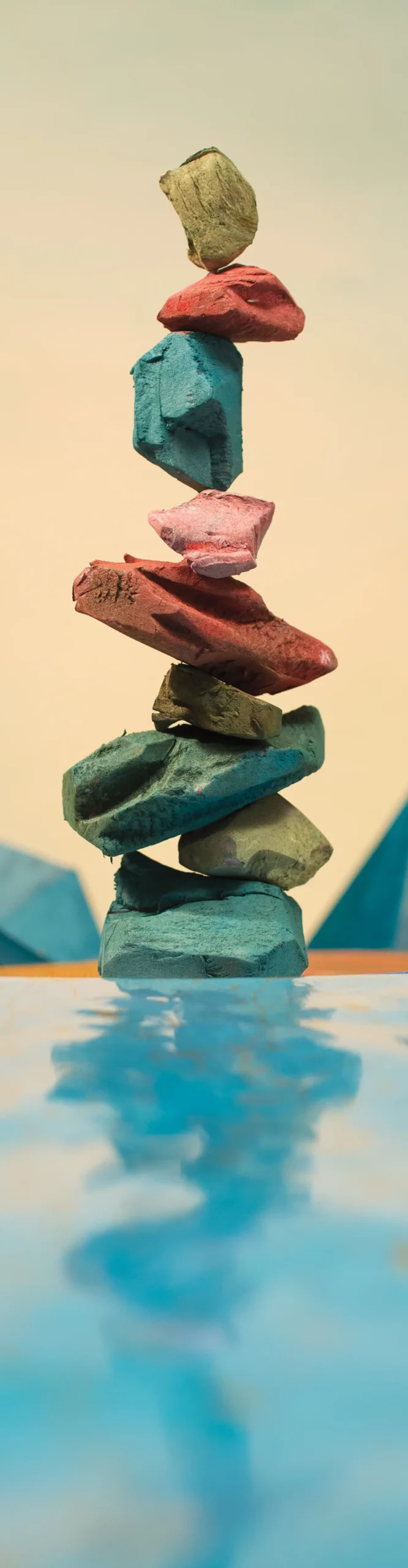 An illustrated stack of colored rocks