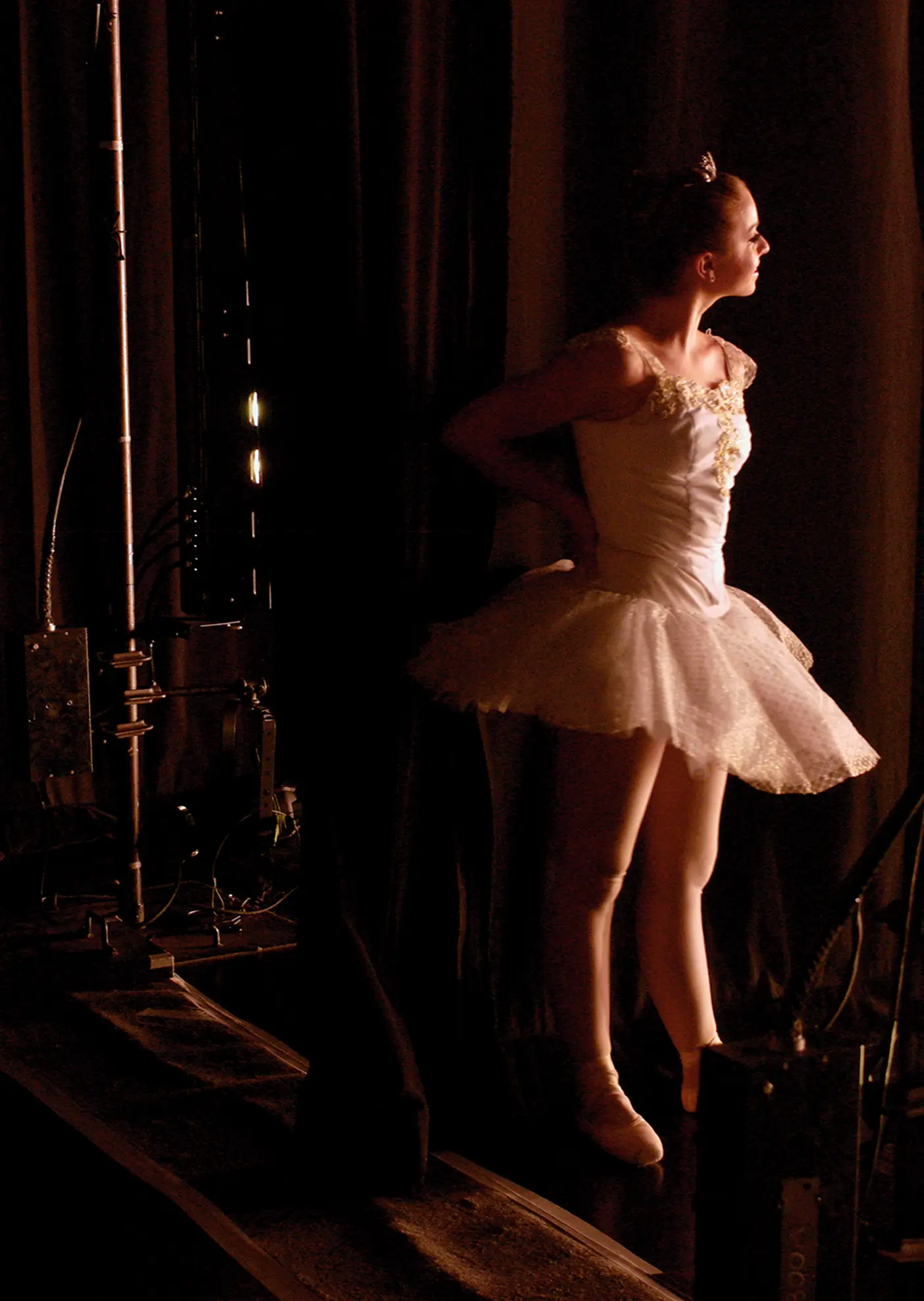 Ballerina just off stage at a performance in the Harris Fine Arts Center.
