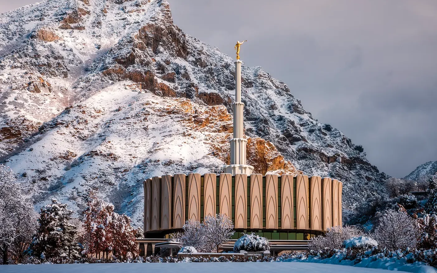 The Provo temple with snowy mountains in the background