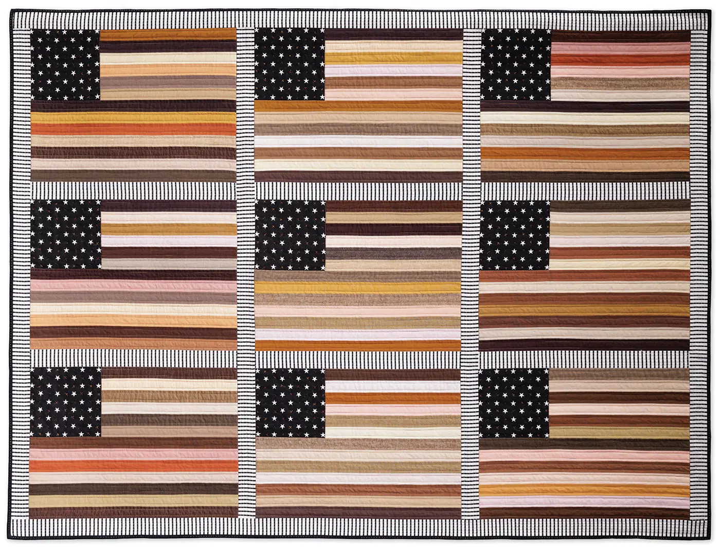A patchwork quilt made of nine American flags in a square grid. The stripes of each flag feature various hues of brown, red, orange, and beige, representing various diverse skin tones.