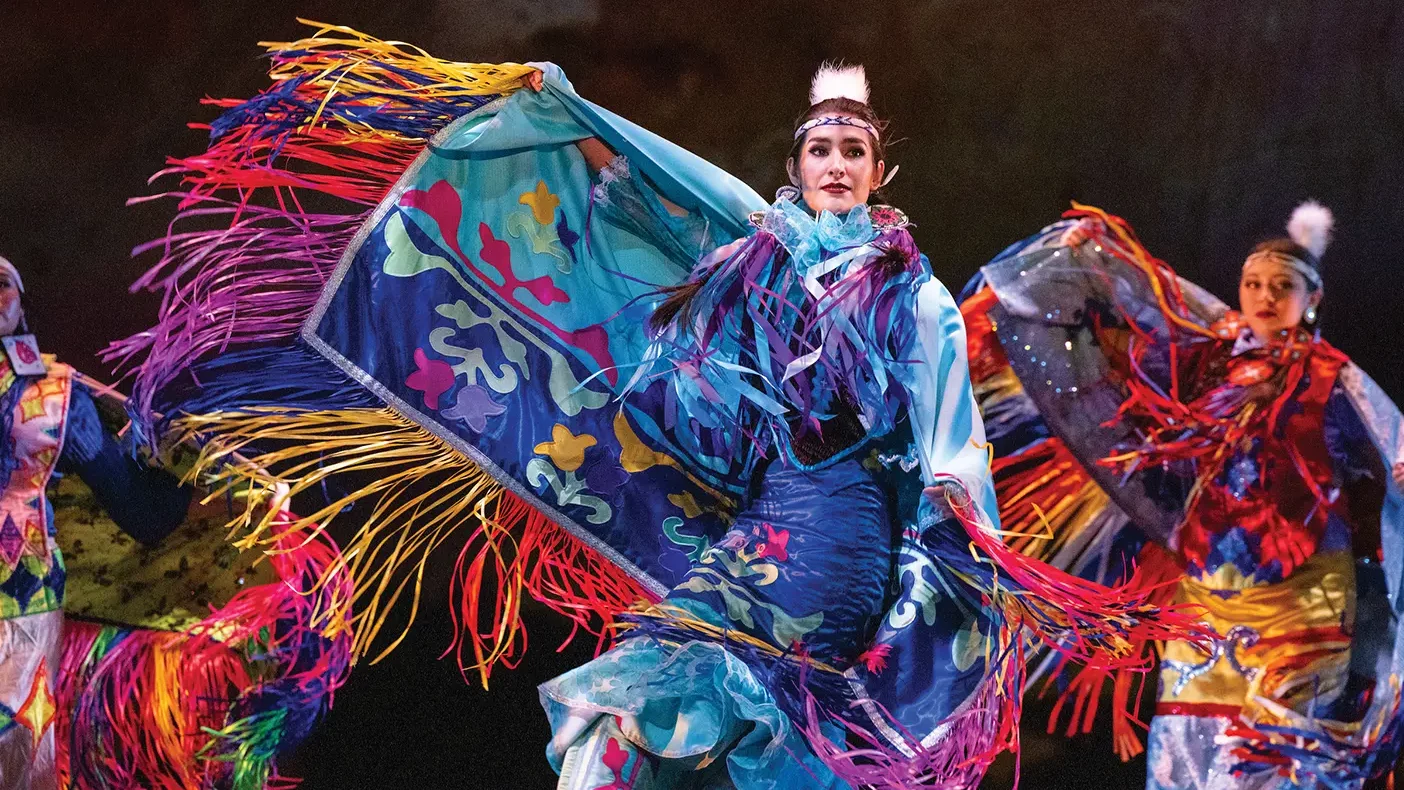 Students in BYU's Living Legends performance ensemble perform a traditional Native American dance.