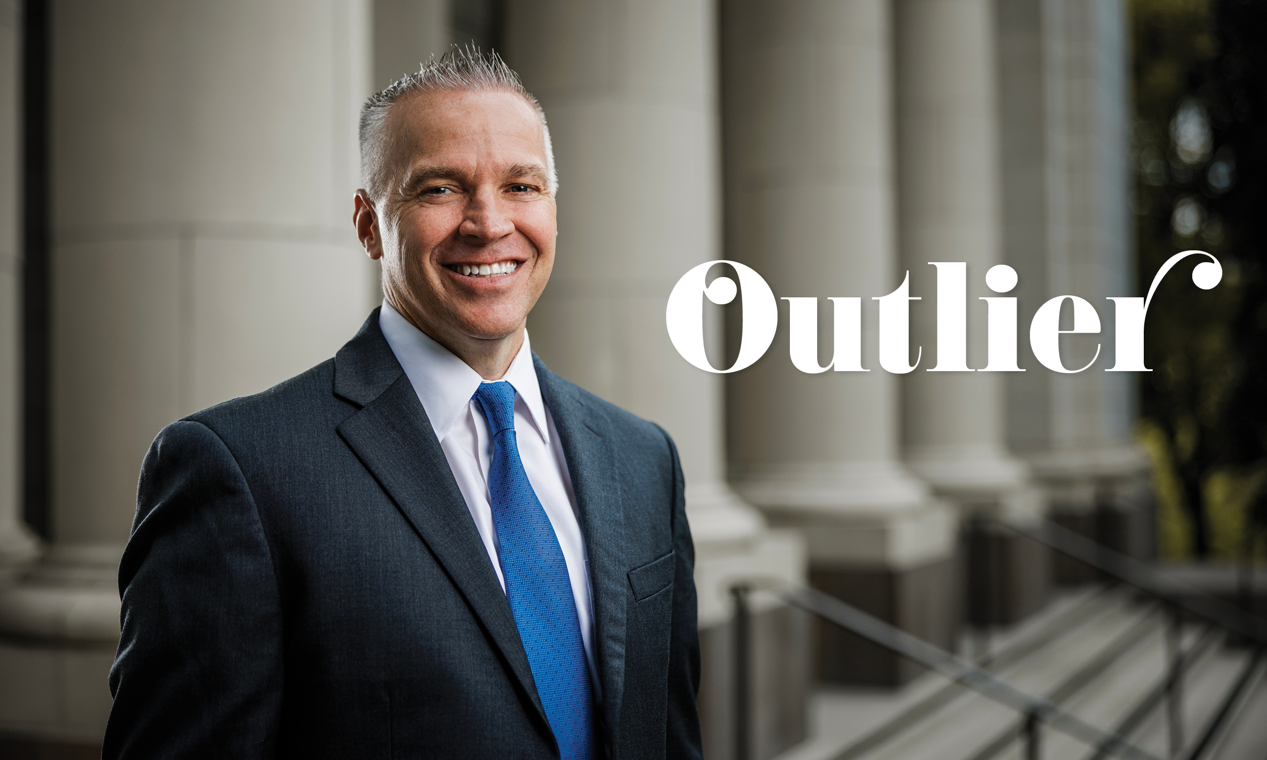 Portrait of new BYU president C. Shane Reese on the steps of the Maeser Building on the campus of Brigham Young University.