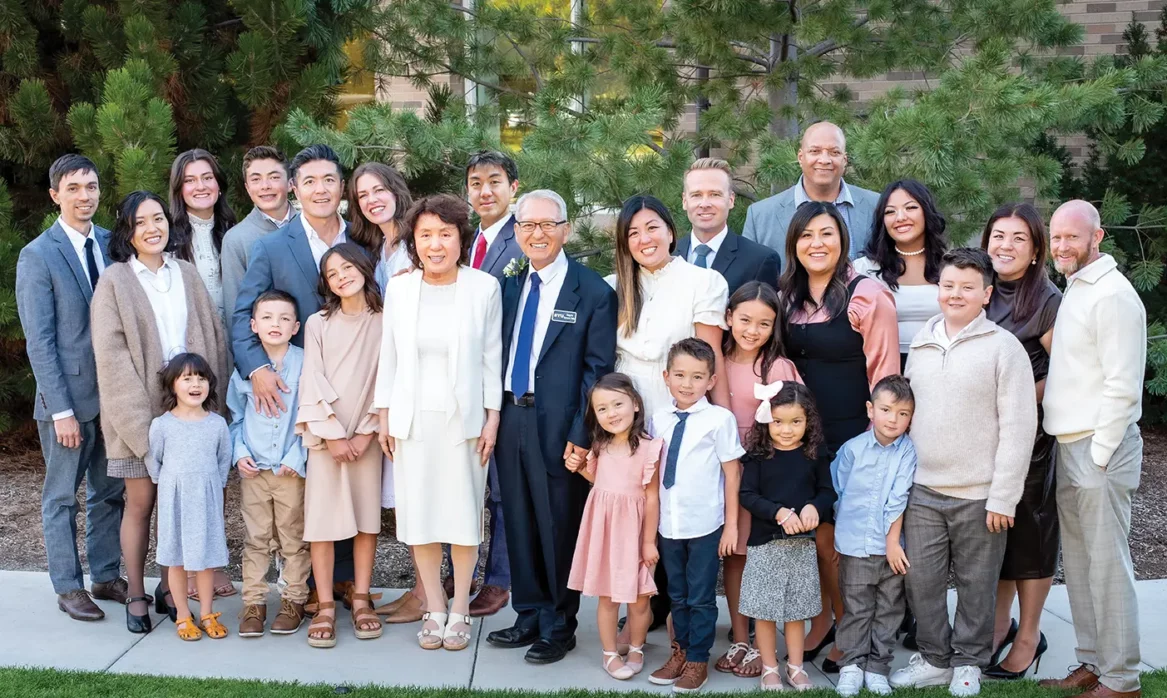 Spencer Shin poses for a picture with his family.