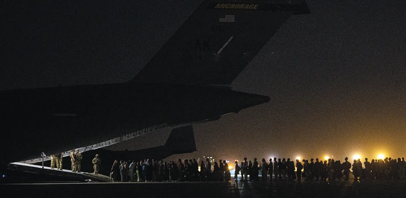 Afghan citizens evacuating via aircraft.
