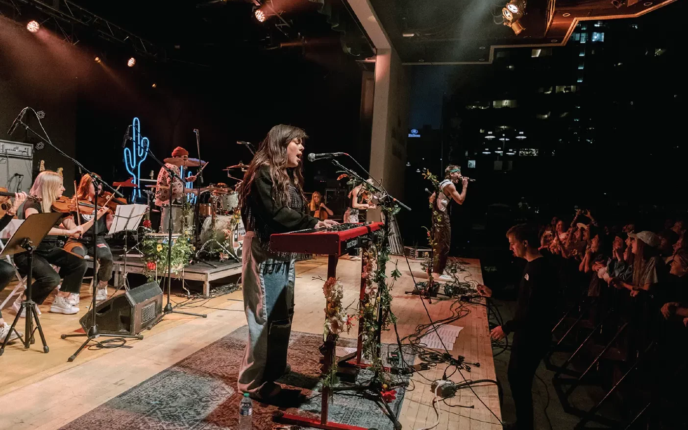 The National Parks performs on-stage alongside the BYU Philharmonic Orchestra.