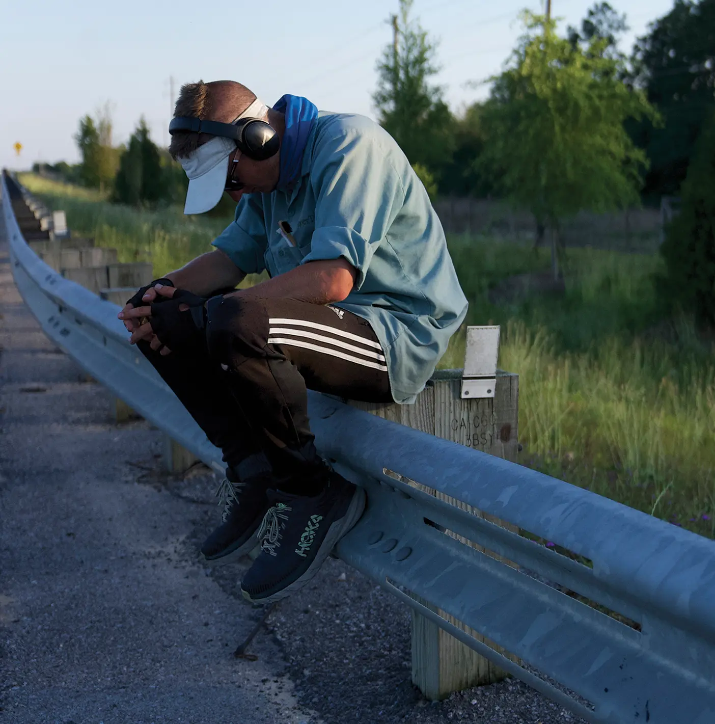 Isaiah Shields sitting alongside a road in Louisiana.