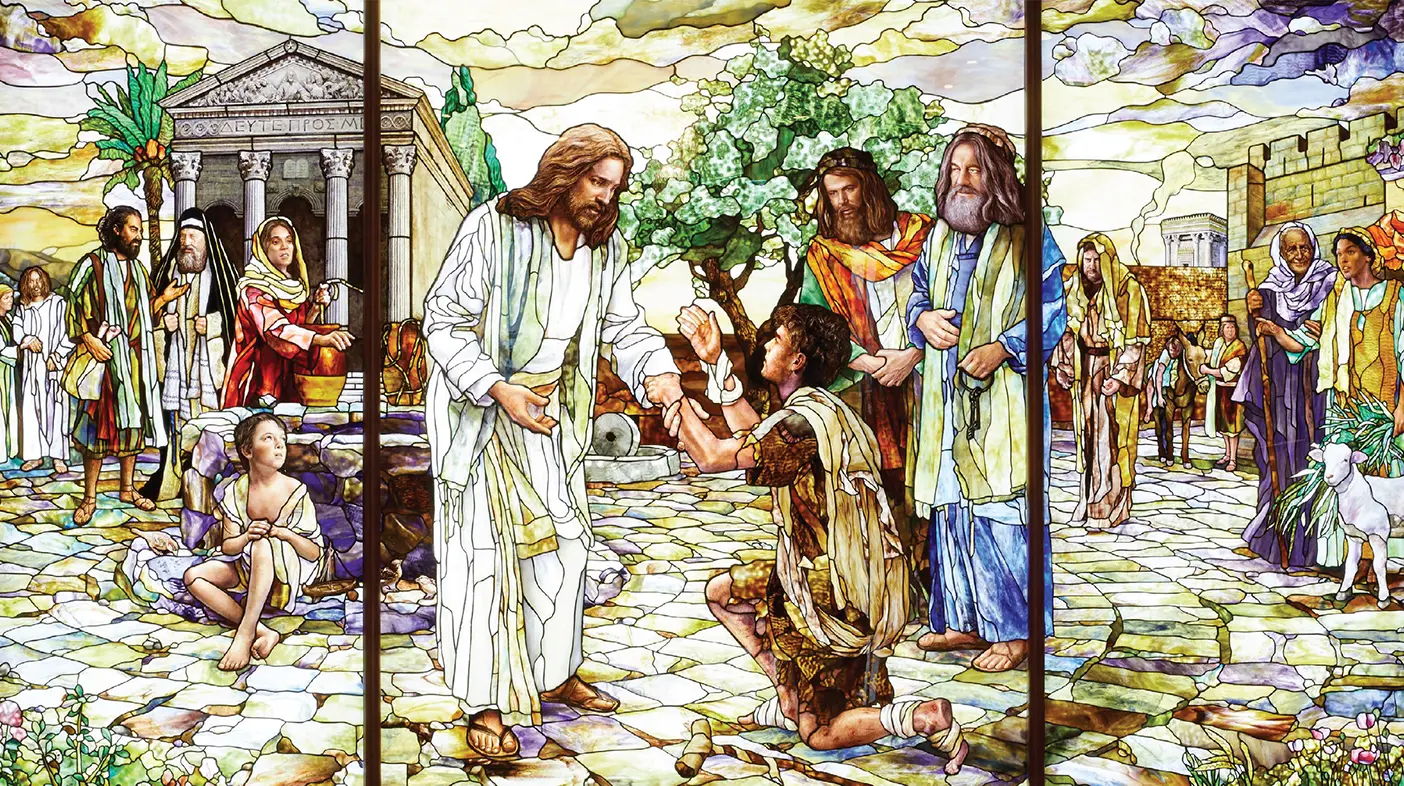 Stained-glass window depicting Jesus Christ ministering to people.