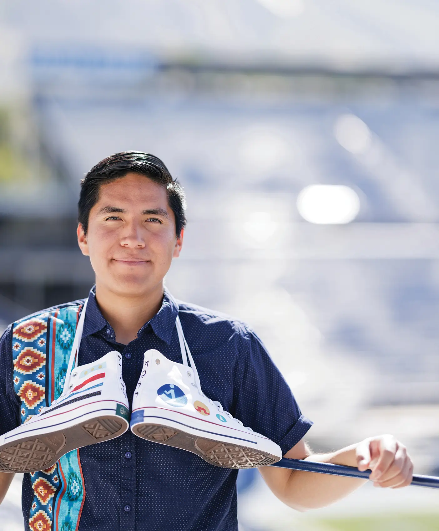 Joseph E. Namingha poses with his tribute to his Native American culture—his sneakers.